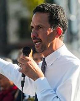 Ralph  Armbruster-Sandoval headshot